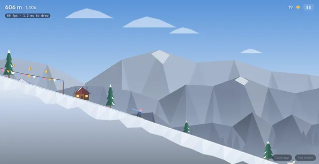 Riding down a snowy slope past a cabin